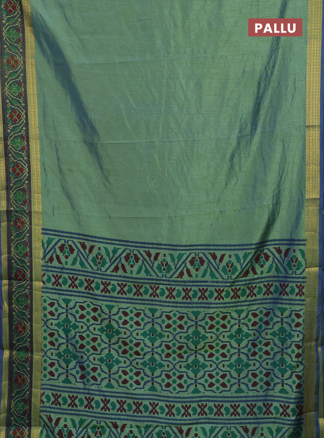 Semi tussar saree dual shade of greenish blue and blue with plain body and ikat woven zari border