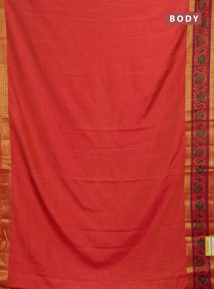Semi tussar saree dual shade of pinkish orange and maroon with plain body and ikat woven zari border