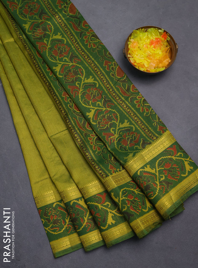 Semi tussar saree light green and green with plain body and ikat woven zari border