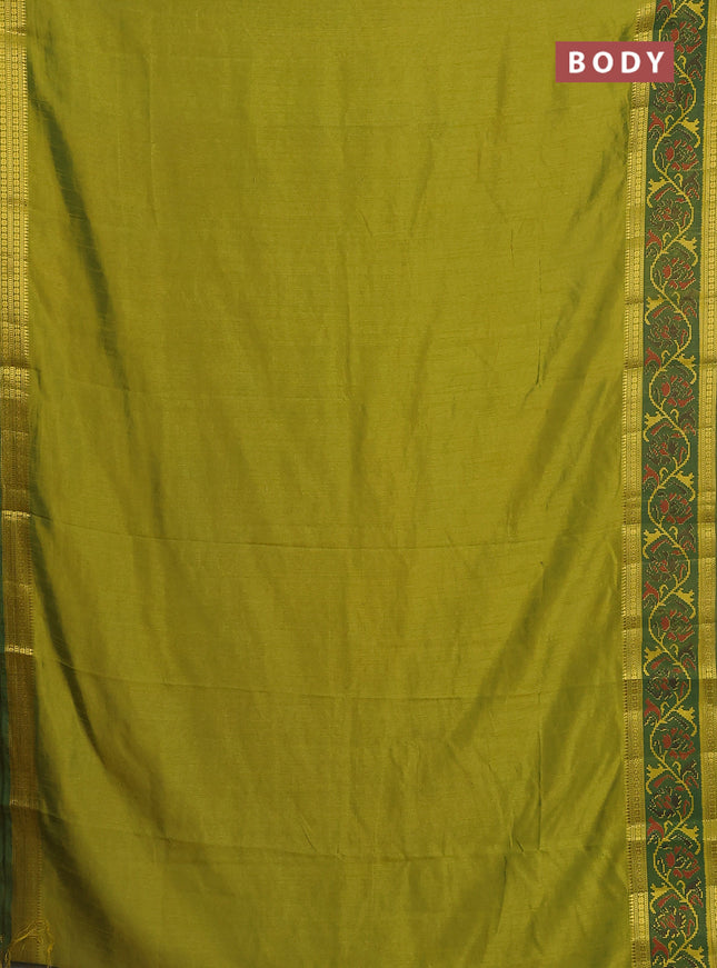 Semi tussar saree light green and green with plain body and ikat woven zari border