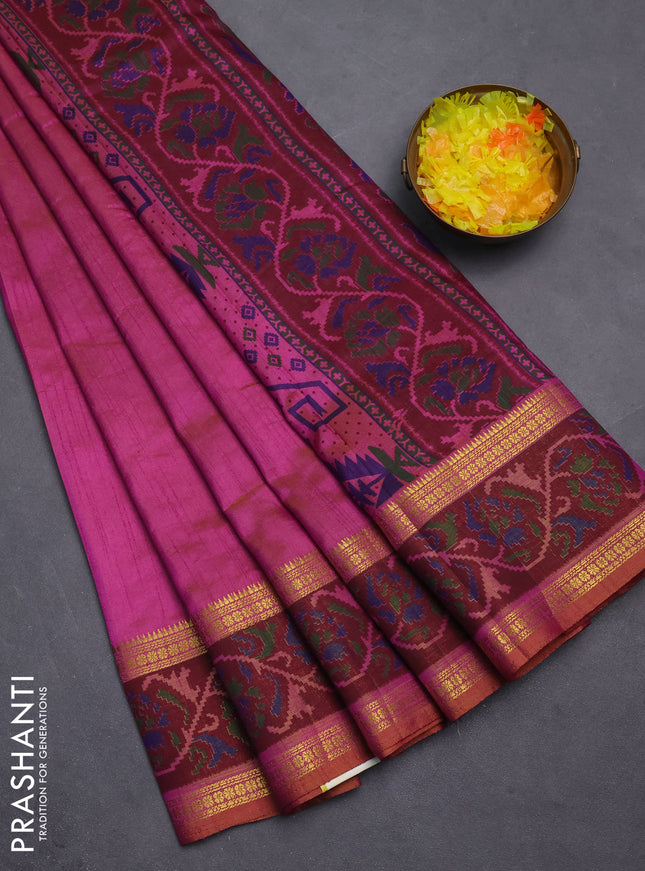 Semi tussar saree dual shade of purple and maroon with plain body and ikat woven zari border
