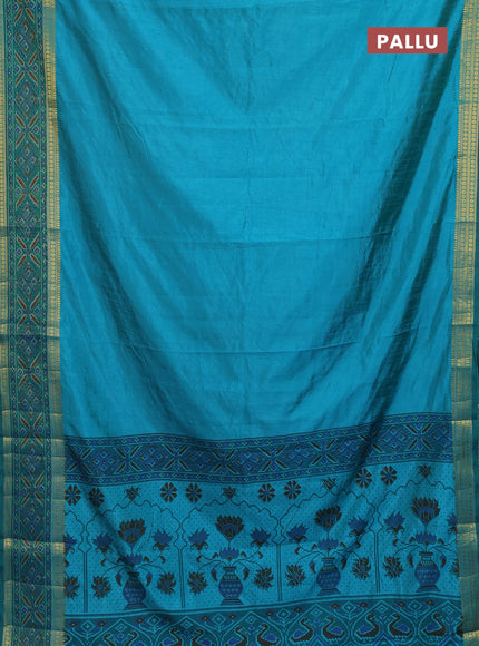 Semi tussar saree teal blue and green with plain body and ikat woven zari border