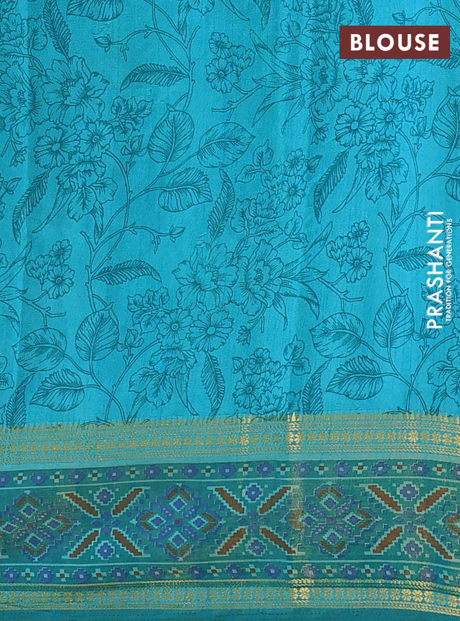 Semi tussar saree teal blue and green with plain body and ikat woven zari border