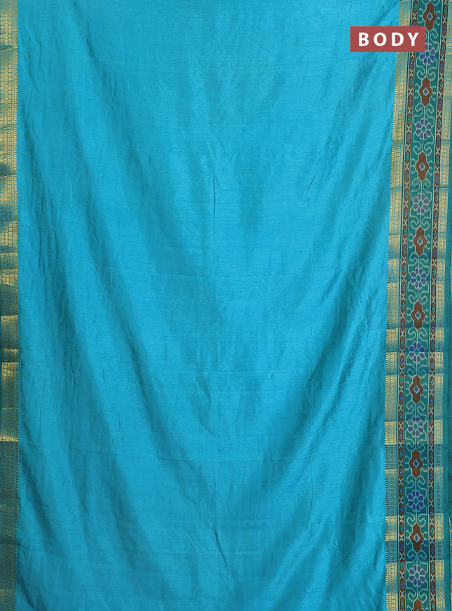 Semi tussar saree dual shade of teal blue and green with plain body and ikat woven zari border