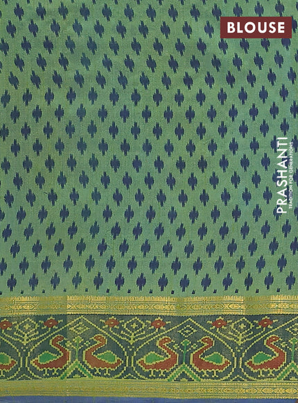 Semi tussar saree dual shade of greenish blue and blue with plain body and ikat woven zari border