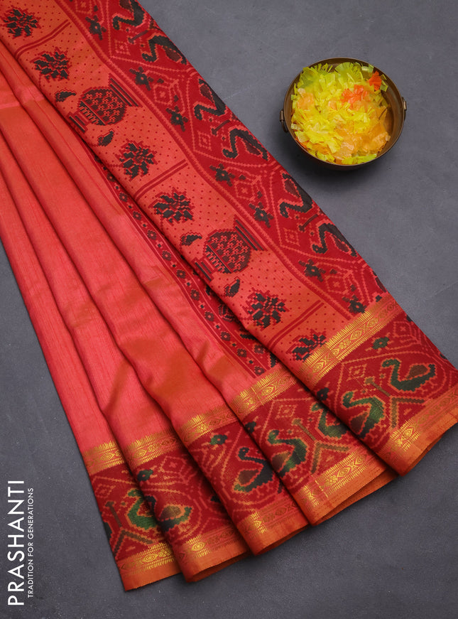 Semi tussar saree dual shade of pinkish orange and maroon with plain body and ikat woven zari border