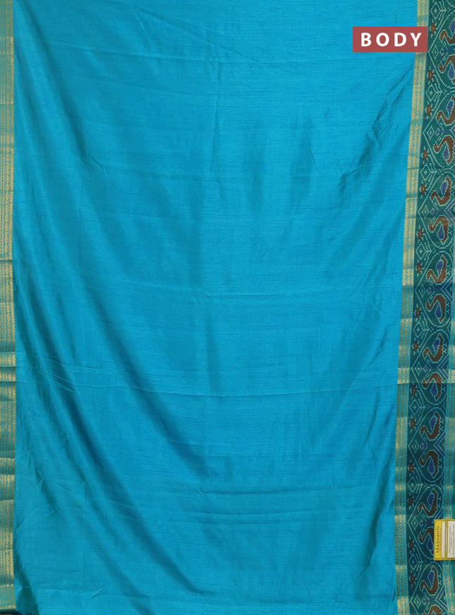 Semi tussar saree dual shade of teal blue and green with plain body and ikat woven zari border