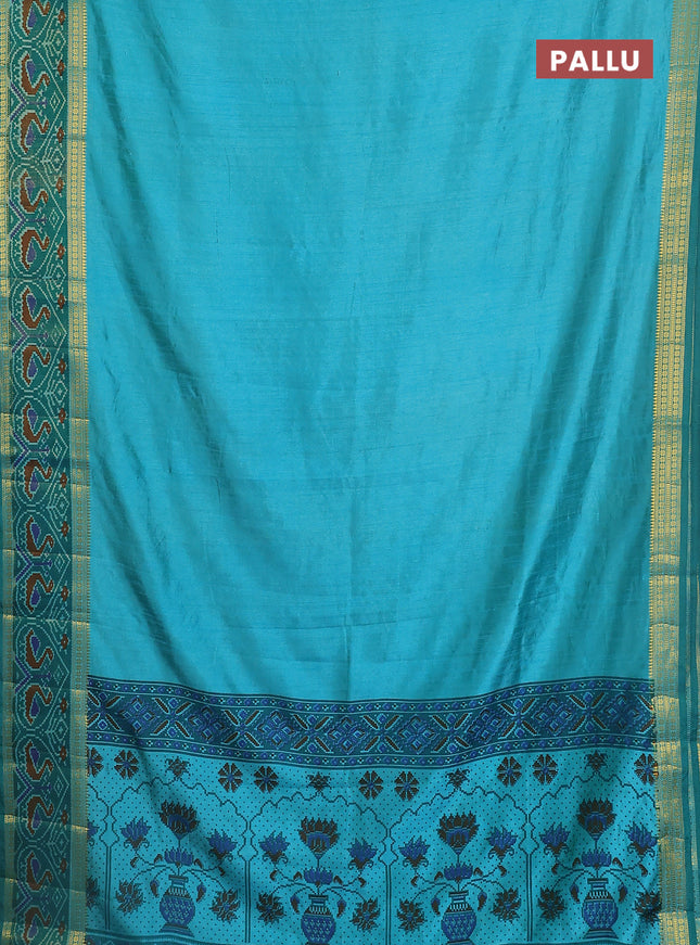 Semi tussar saree dual shade of teal blue and green with plain body and ikat woven zari border