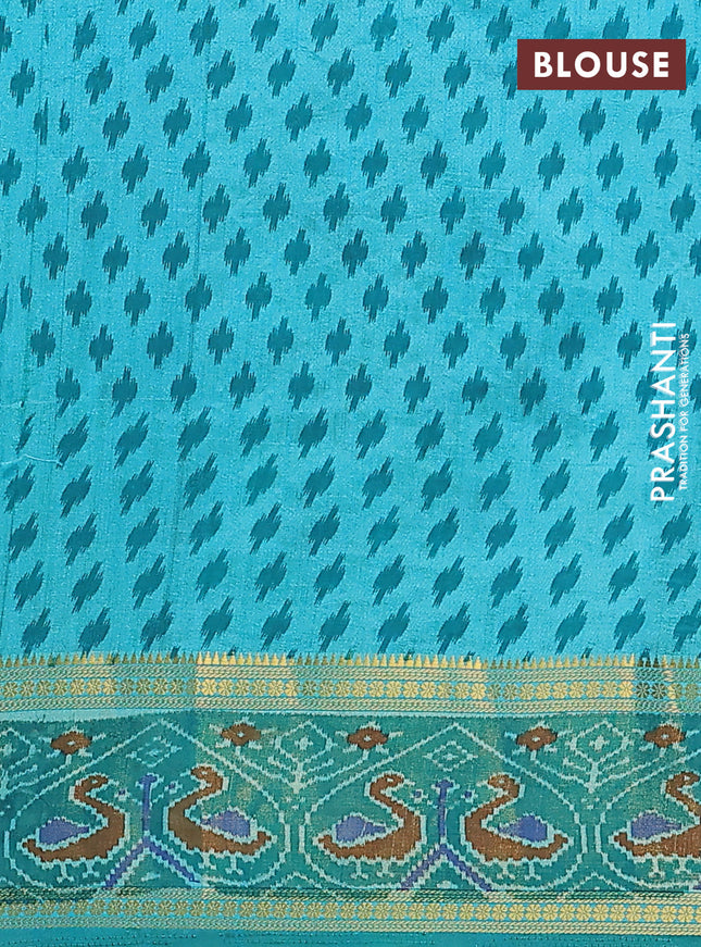 Semi tussar saree dual shade of teal blue and green with plain body and ikat woven zari border
