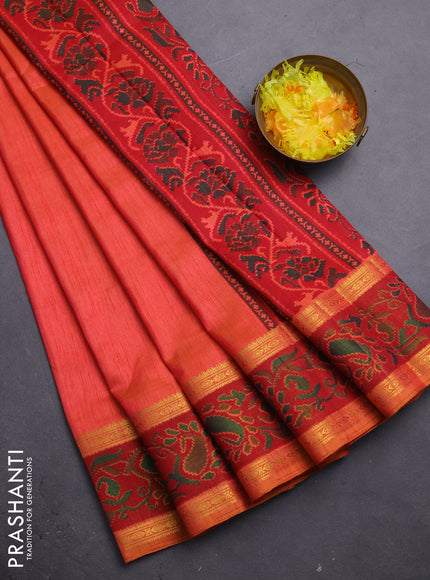 Semi tussar saree dual shade of pinkish orange and maroon with plain body and ikat woven zari border
