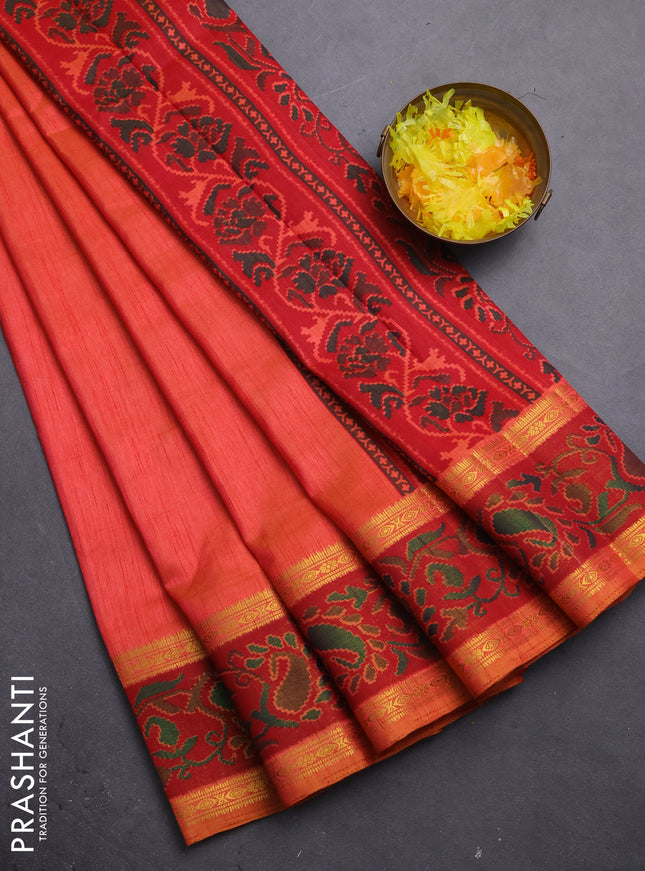 Semi tussar saree dual shade of pinkish orange and maroon with plain body and ikat woven zari border