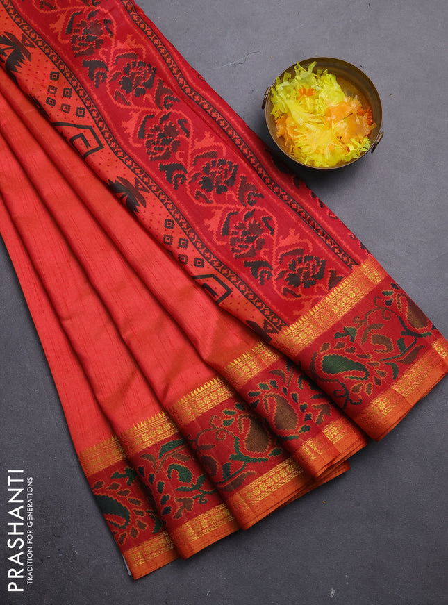 Semi tussar saree dual shade of pinkish orange and maroon with plain body and ikat woven zari border