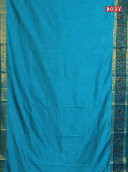 Semi tussar saree dual shade of teal blue and green with plain body and ikat woven zari border