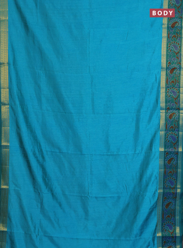 Semi tussar saree dual shade of teal blue and green with plain body and ikat woven zari border