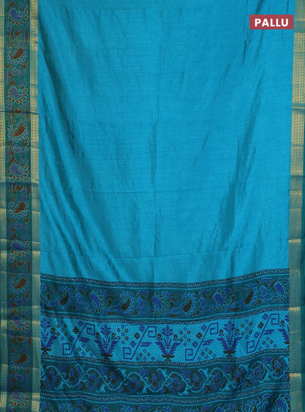 Semi tussar saree dual shade of teal blue and green with plain body and ikat woven zari border