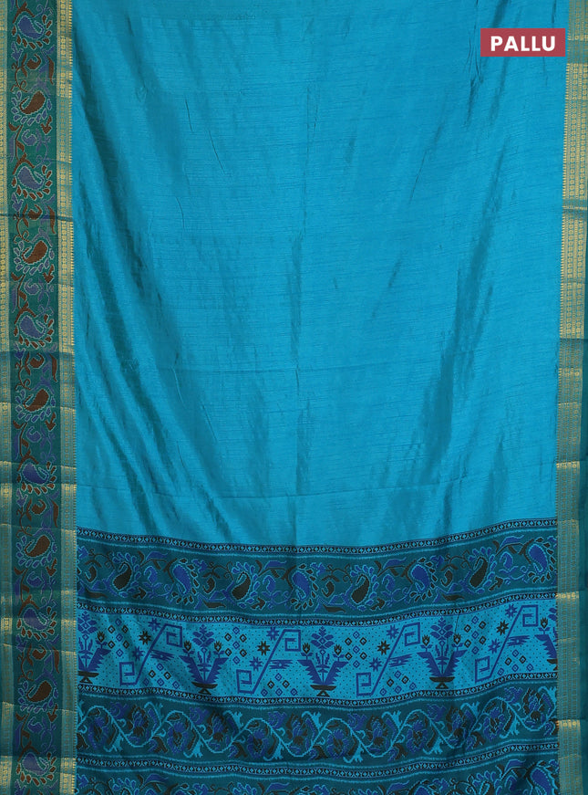 Semi tussar saree dual shade of teal blue and green with plain body and ikat woven zari border