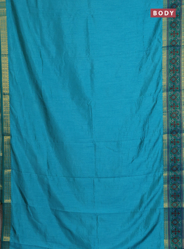 Semi tussar saree dual shade of teal blue and green with plain body and ikat woven zari border