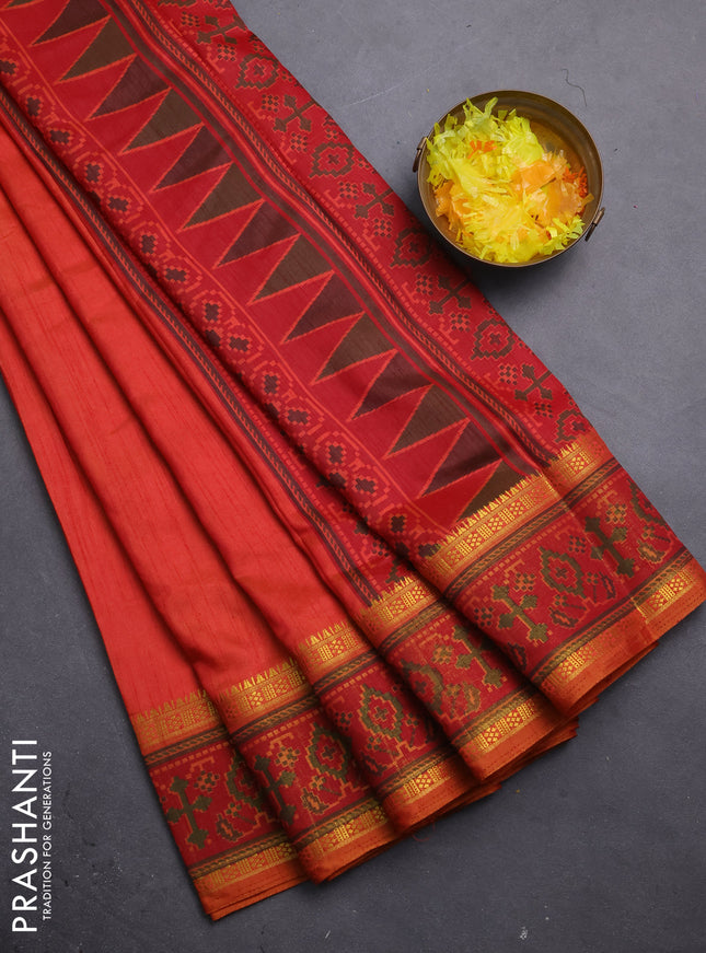 Semi tussar saree dual shade of pinkish orange and maroon with plain body and ikat woven zari border