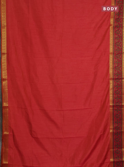 Semi tussar saree dual shade of pinkish orange and maroon with plain body and ikat woven zari border