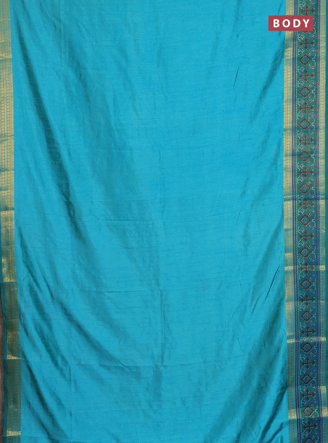 Semi tussar saree dual shade of teal blue and green with plain body and ikat woven zari border