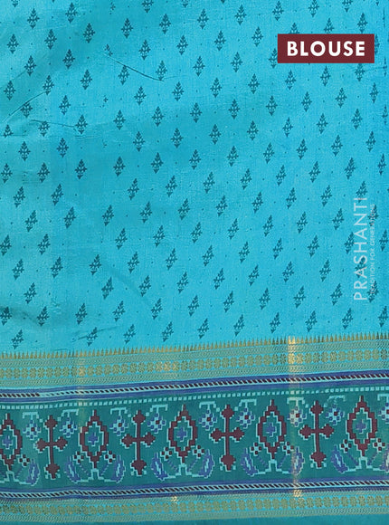 Semi tussar saree dual shade of teal blue and green with plain body and ikat woven zari border