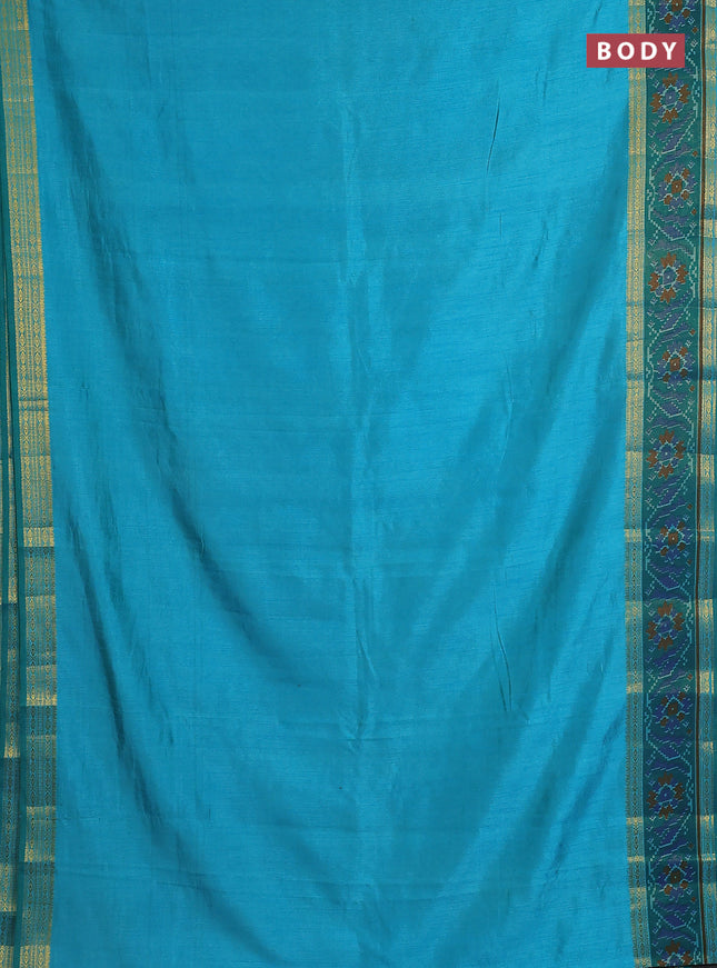 Semi tussar saree teal blue and green with plain body and ikat woven zari border