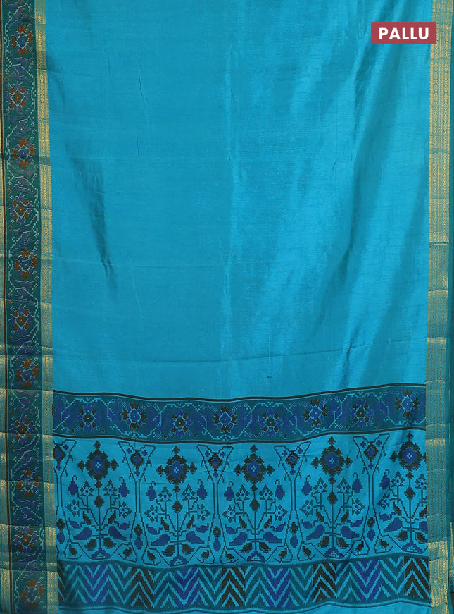Semi tussar saree teal blue and green with plain body and ikat woven zari border
