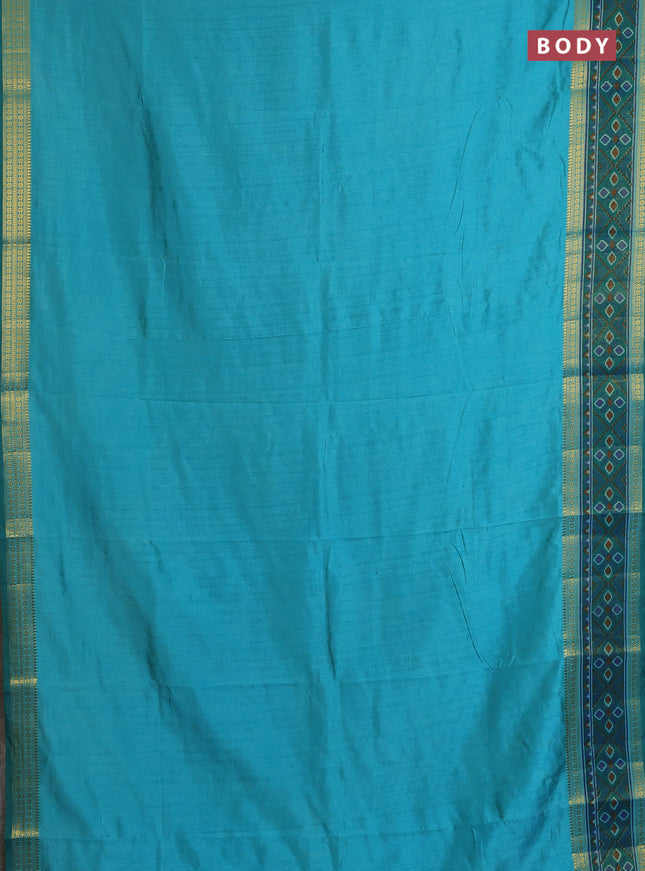 Semi tussar saree dual shade of teal blue and green with plain body and ikat woven zari border