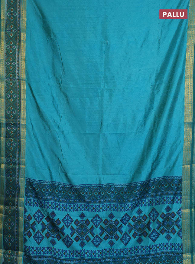 Semi tussar saree dual shade of teal blue and green with plain body and ikat woven zari border
