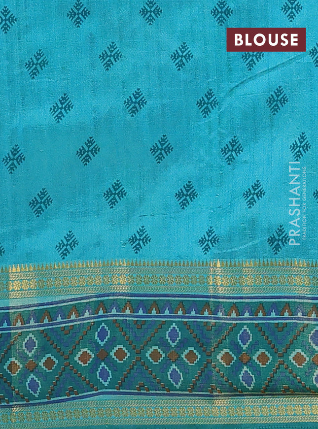 Semi tussar saree dual shade of teal blue and green with plain body and ikat woven zari border