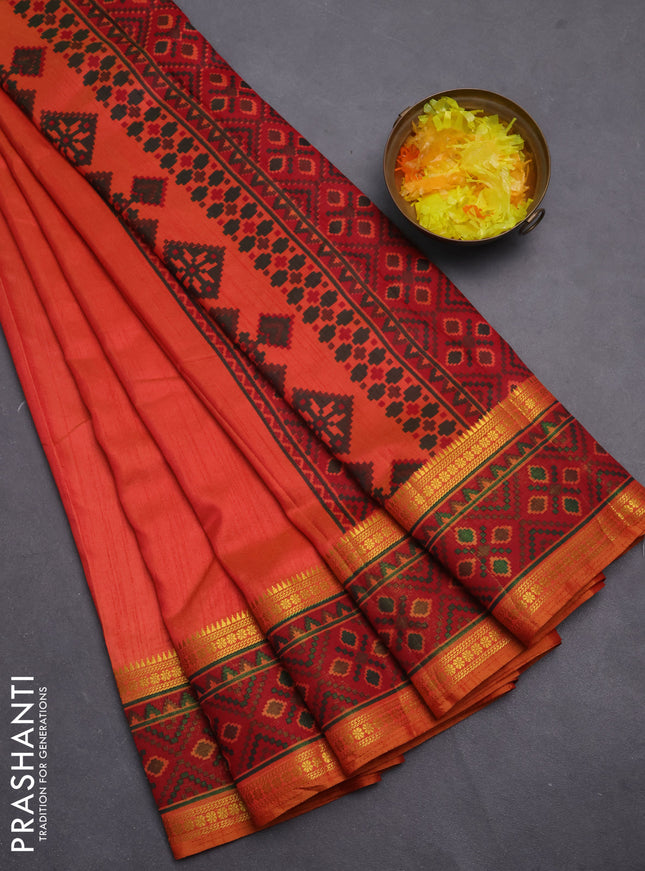 Semi tussar saree dual shade of pinkish orange and maroon with plain body and ikat woven zari border