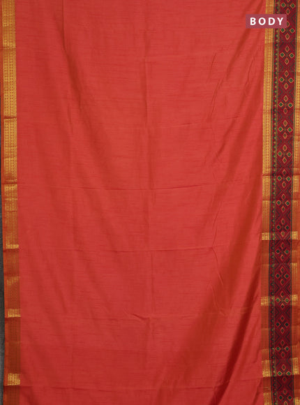 Semi tussar saree dual shade of pinkish orange and maroon with plain body and ikat woven zari border