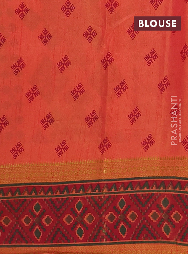 Semi tussar saree dual shade of pinkish orange and maroon with plain body and ikat woven zari border
