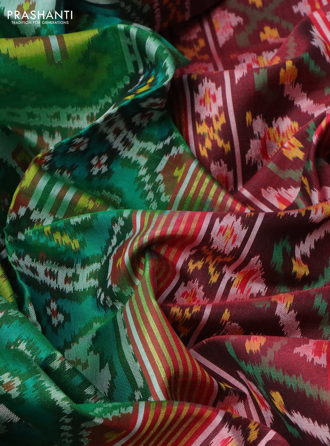 Rajkot patola silk saree green and maroon with allover patola weaves and ikat woven border