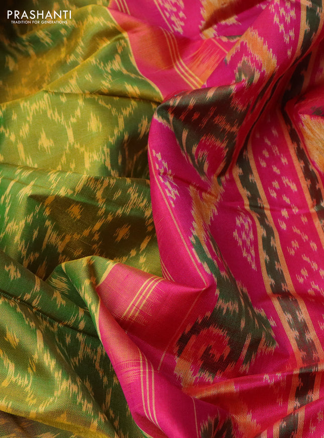 Rajkot patola silk saree light green and pink with allover ikat weaves and ikat woven zari border