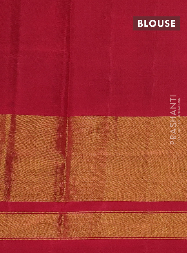 Rajkot patola silk saree dual shade of green and red with allover ikat butta weaves and ikat woven zari border