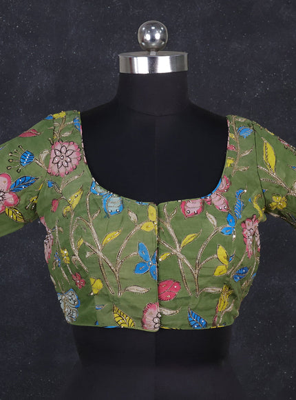 Silk penkalamkari readymade blouse green with allover kalamkari prints & pita work and back knot