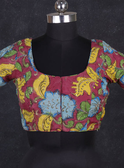 Silk penkalamkari readymade blouse wine shade with allover kalamkari prints & pita work and back knot