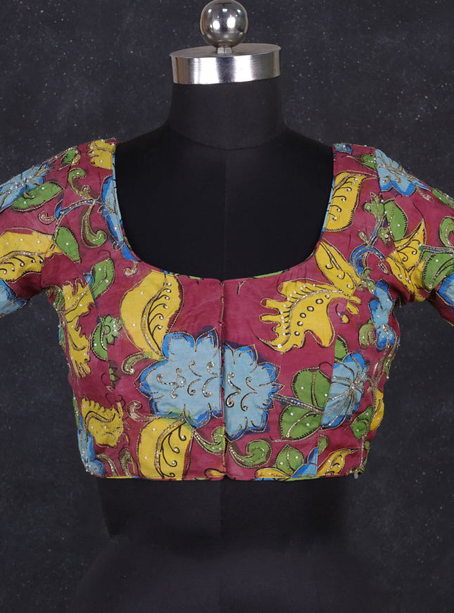 Silk penkalamkari readymade blouse wine shade with allover kalamkari prints & pita work and back knot