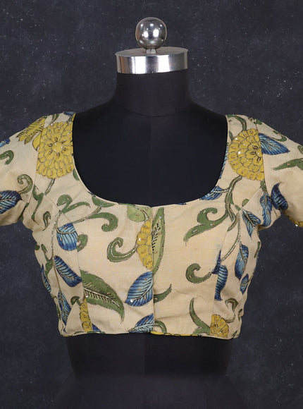 Silk penkalamkari readymade blouse cream with allover kalamkari prints & pita work and back knot