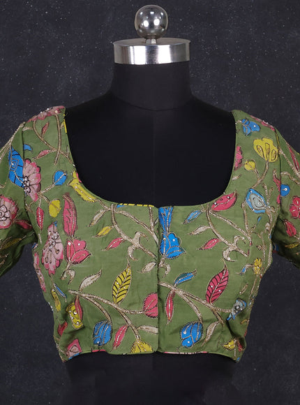 Silk penkalamkari readymade blouse green with allover kalamkari prints & pita work and back knot