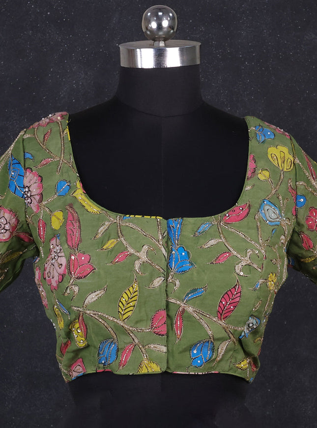 Silk penkalamkari readymade blouse green with allover kalamkari prints & pita work and back knot