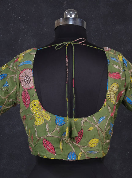 Silk penkalamkari readymade blouse green with allover kalamkari prints & pita work and back knot