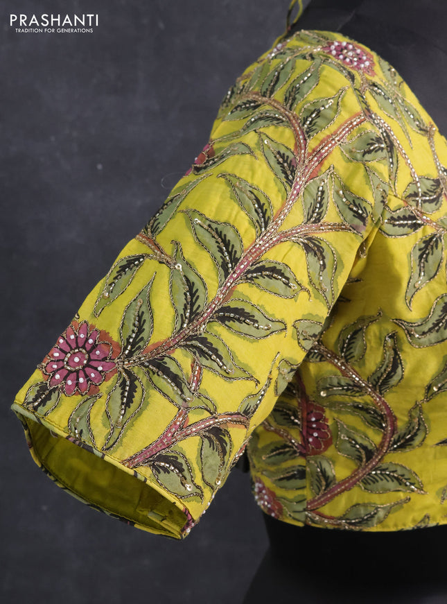 Silk penkalamkari readymade blouse lime yellow with allover kalamkari prints & pita work and back knot