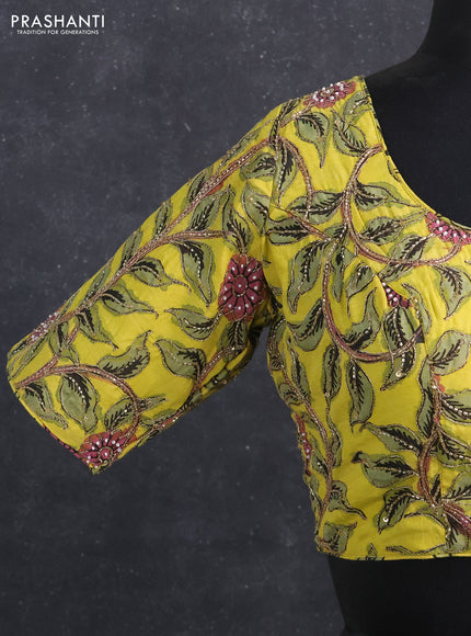 Silk penkalamkari readymade blouse lime yellow with allover kalamkari prints & pita work and back knot