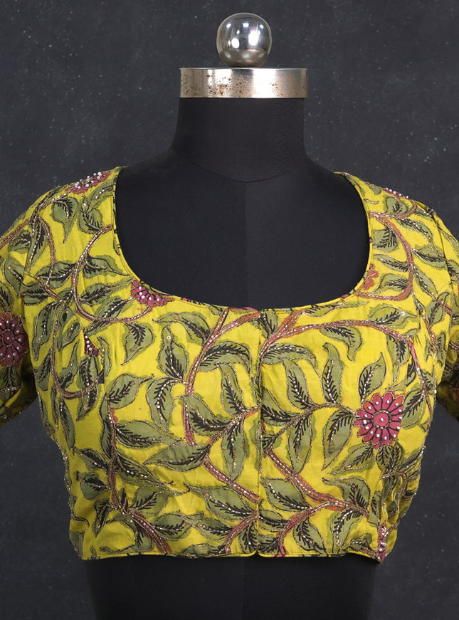 Silk penkalamkari readymade blouse lime yellow with allover kalamkari prints & pita work and back knot