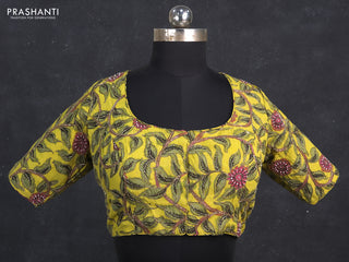 Silk penkalamkari readymade blouse lime yellow with allover kalamkari prints & pita work and back knot