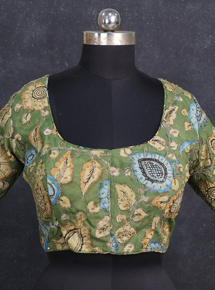 Silk penkalamkari readymade blouse green with allover kalamkari prints & pita work and back knot
