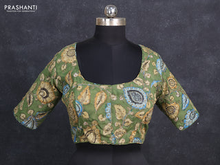 Silk penkalamkari readymade blouse green with allover kalamkari prints & pita work and back knot