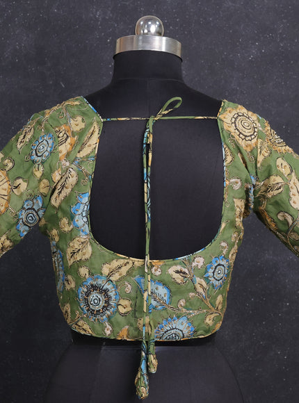Silk penkalamkari readymade blouse green with allover kalamkari prints & pita work and back knot